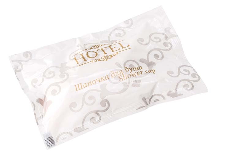 Шапочка для душа Hotel (Отель) используется в душевых и ванных комнатах гостиничных номеров. Упакована в саше. В коробке 500 штук.